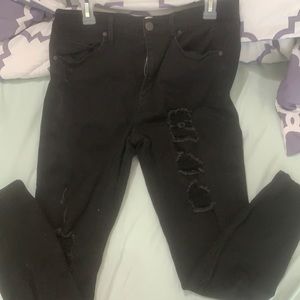 Black skinny jeans with rips